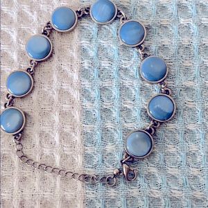 Blue and silver bracelet .